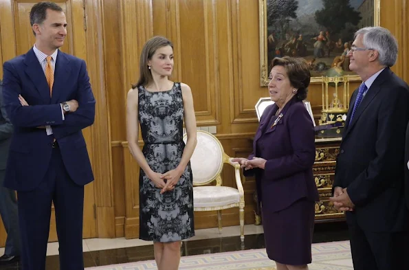 Queen Letizia hold Audience at Zarzuela Palace. Queen Letiza wore HUGO BOSS Dress and PRADA Pumps, Tous Jewelry