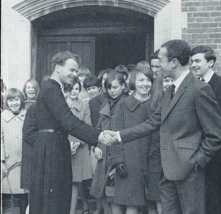 Revd Michael Cooper and Ron Robinson outside the Church of the Resurrection