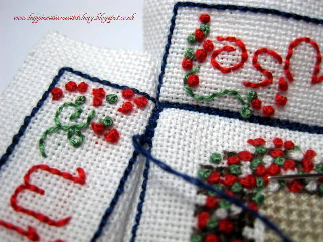 Cross stitched cottage with french knots a tutorial showing how to finish into a mattress pincushion