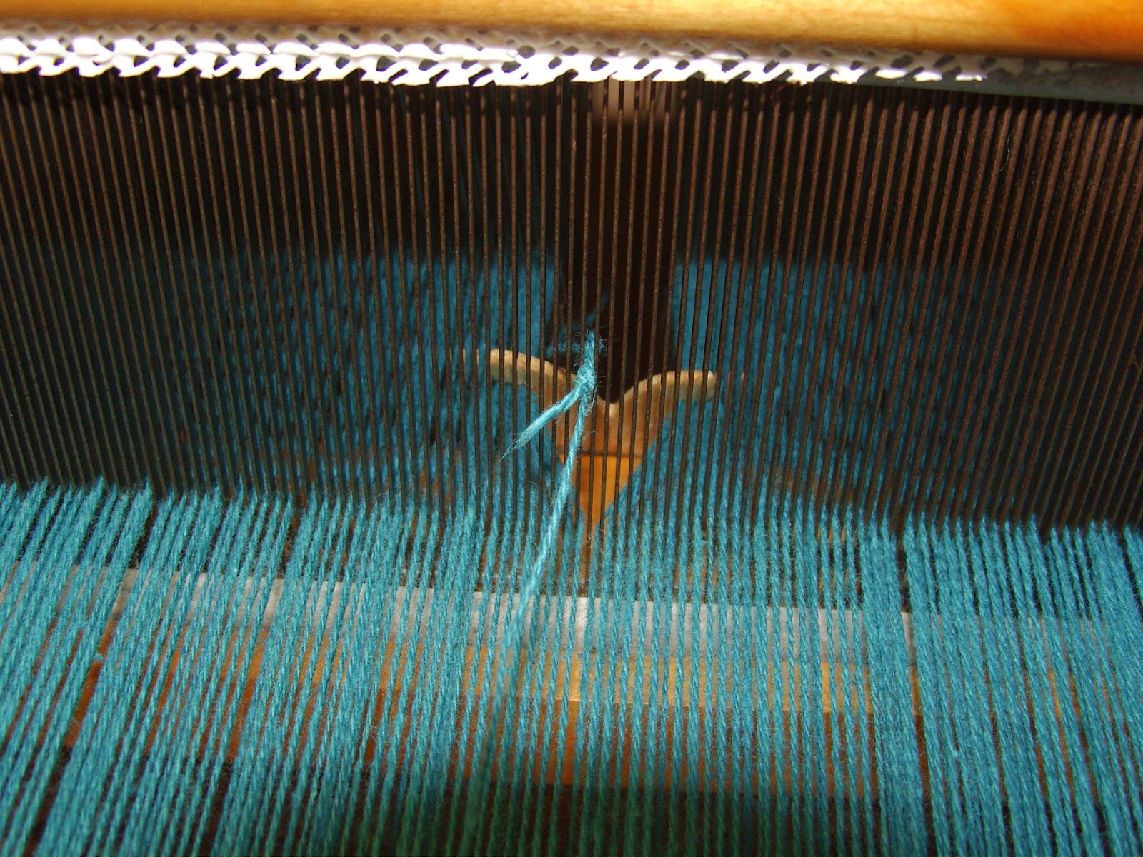 Daisy Hill Weaving Studio: Repairing a Broken Warp Thread on the Loom