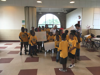 Laurel and Audrey with summer day campers at East Side Community Center