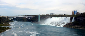 View of American Falls and Rainbow Bridge from Queen Victoria Park in Canada View of American Falls and Rainbow Bridge from Queen Victoria Park in Canada