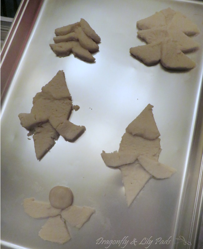 Wilton Gold Cookie Sheet with Sugar Cookie Shapes ready to Bake in the Oven.