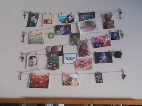 DIY photo display using twine and clothes pins
