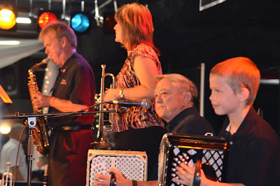 Third generation joins Polka band playing concertina Photo by Trisha Field