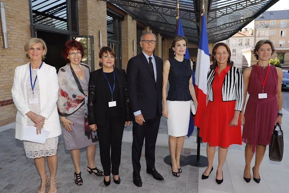 Queen Letizia attends the climate and health conference in Paris. Queen Letizia wore Nina Ricci Sleeveless top, Magrit sandals, Hugo Boss Skirt