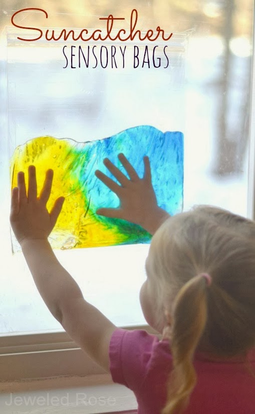 Sun-catcher sensory bags are easy to make, mess free, and allow kids to explore in all sorts of ways