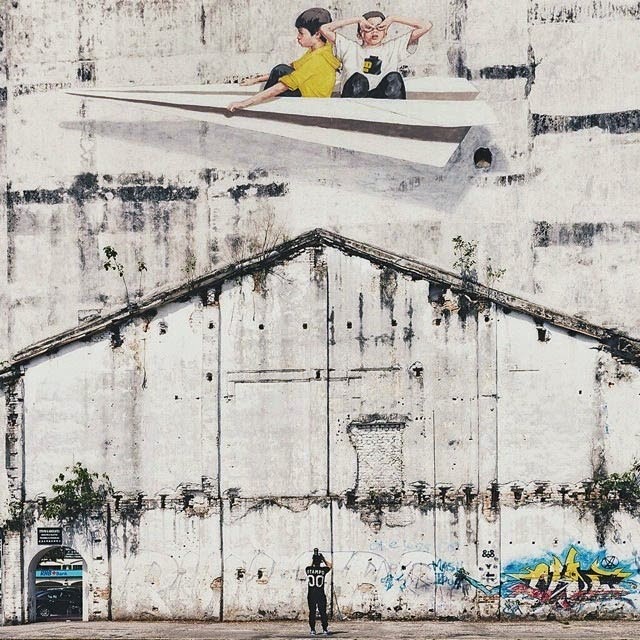 After travelling throughout Europe for several events and festivals in the last months, Ernest Zacharevic is back on the streets of Malaysia where he's been hard at work in Ipoh.