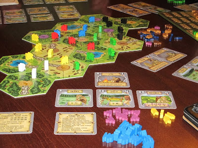 Power Grid: The First Sparks - The game board, cards and clansmen