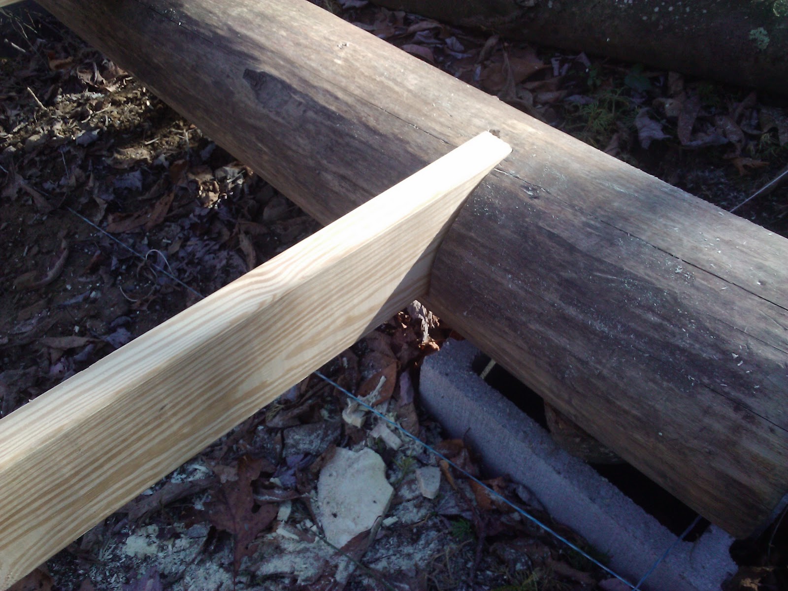 Full Boar Lean Homestead: Notching in and levelling floor joists