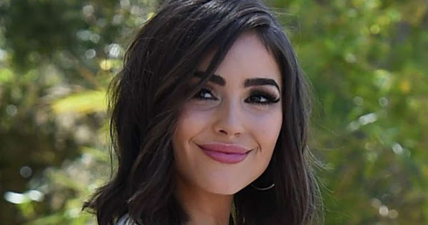 Olivia Culpo bares sideboob at the Popsugar Coachella Party in Palm Springs