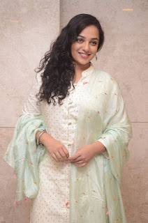 nitya menon at 100 days of love audio launch nitya menon at 100 days of love audio launch