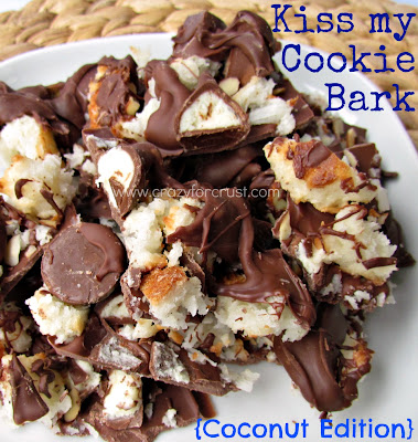 bark made out of macaroon cookies, hersheys kisses and chocolate all jumbled up on a white plate