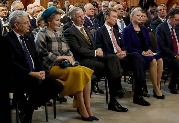 Queen Mathilde wore asymmetric yellow midi dress Natan aw2019 collection. The Queen wore a new asymmetric yellow midi dress by Natan