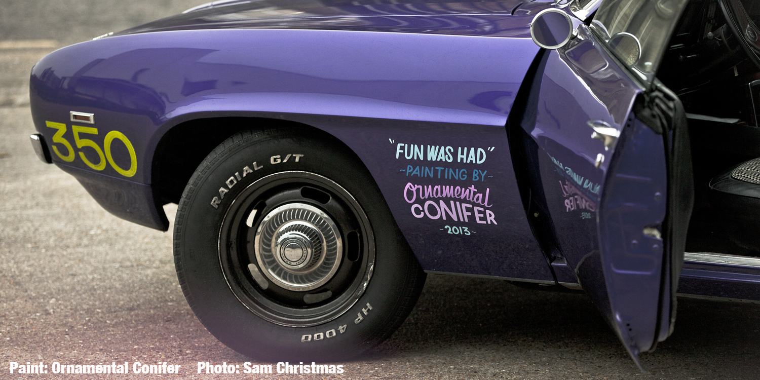 CAFÉ RACER 76 car by ornamental conifer