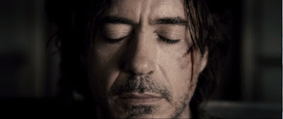 Sherlock Holmes (Robert Downey Jr.) performing his Holmesavision Sherlock Holmes (Robert Downey Jr.) performing his Holmesavision