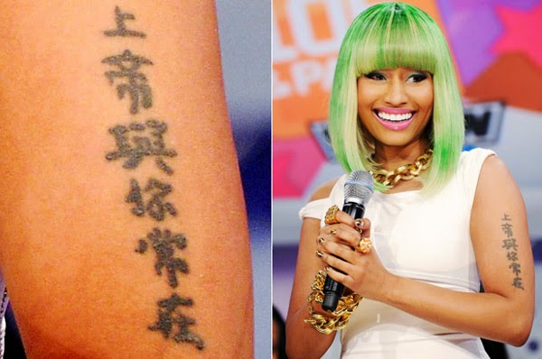 7. Nicki Minaj's "Queen" Tattoo and Its Symbolism - wide 6