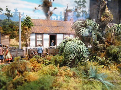 Model of Tangarakau township circa 1930, with a coal carts in front.