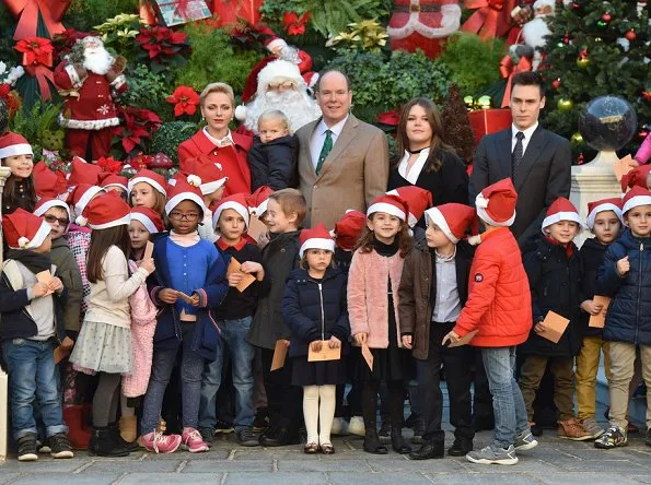 Prince Albert, Princess Charlene, Prince Jacques and Princess Gabriella attended the Children's Christmas ceremony and the Christmas gifts distribution at the Monaco Palace.