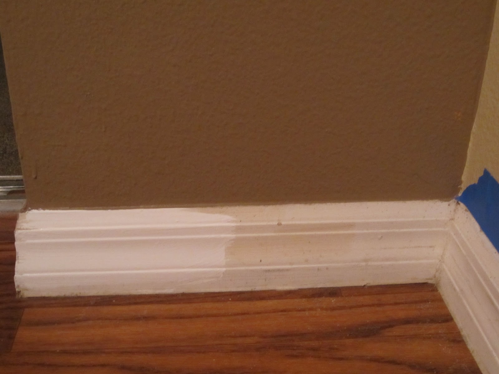 Home Is Where The Fishers Are Painting baseboards, trim, and doors