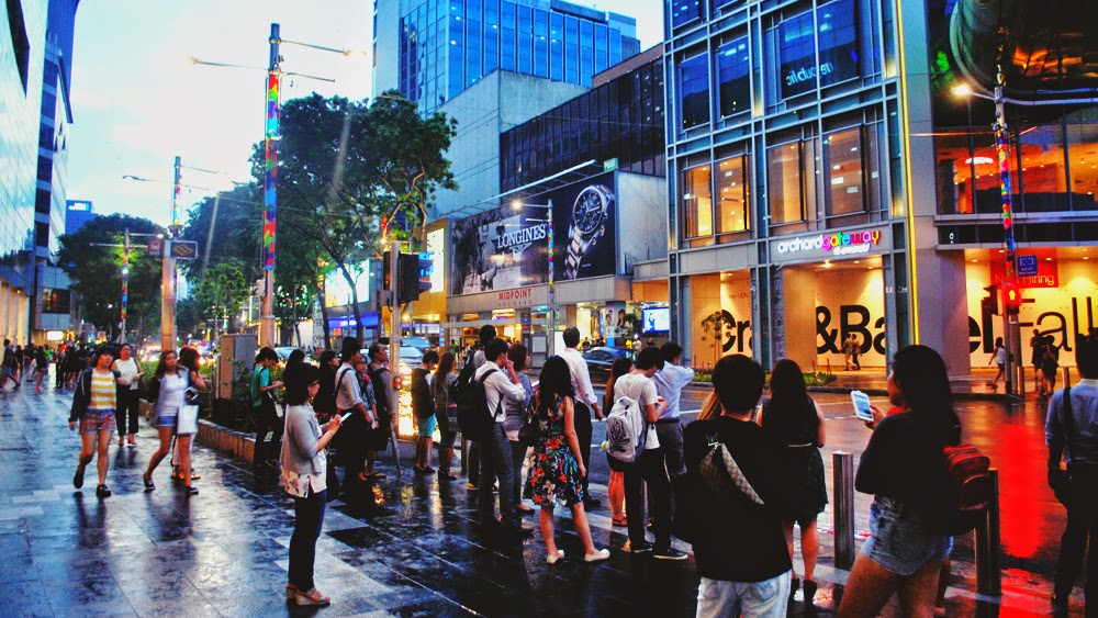 Hours after the rain, during evening rush hour at Orchard Road.