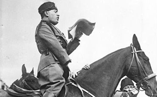 Benito Mussolini giving a speech (August 1929) - Source: German Federal Archives. Benito Mussolini giving a speech (August 1929) - Source: German Federal Archives.