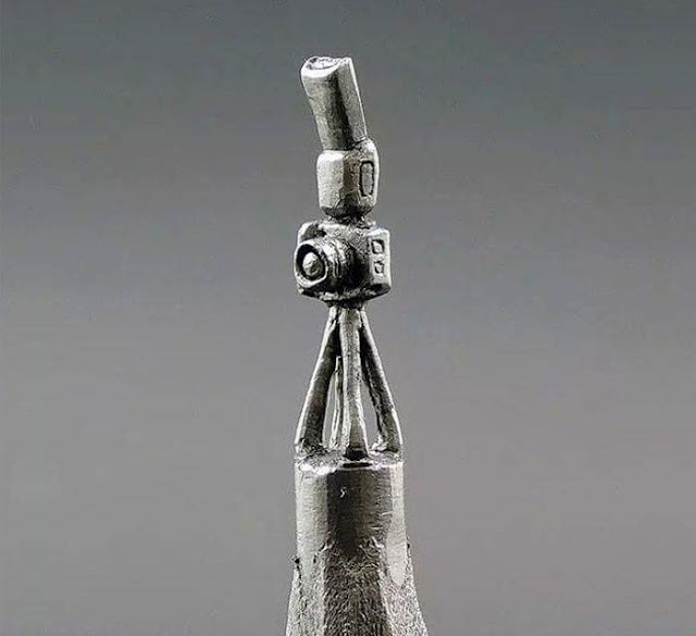 مجموعة صور لاجمل ابداع لاففنون النقش على (( لب)) أو اقلام الرصاص,,