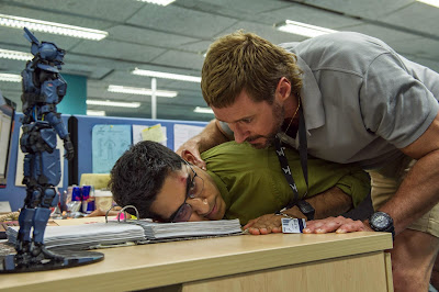 Hugh Jackman and Dev Patel in Chappie