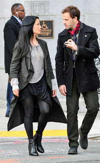 Jonny Lee Miller and Lucy Liu as Sherlock Holmes and Joan Watson in CBS Elementary Jonny Lee Miller and Lucy Liu as Sherlock Holmes and Joan Watson in CBS Elementary