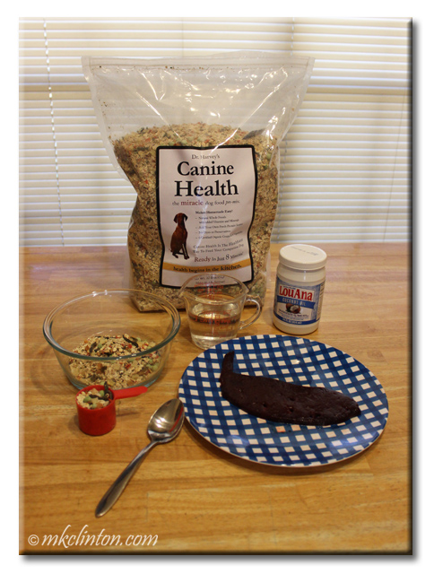 Dr. Harvey's Canine Health, a piece of beef liver, coconut oil and measuring cup of water.