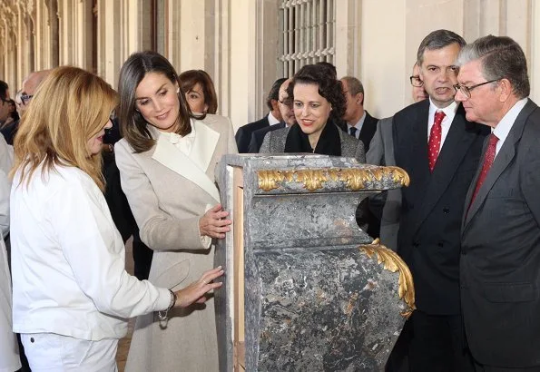 Queen Letizia carried Carolina Herrera Authenticity Card Camelot Collection Handbag and she wore Carolina Herrera wool and cashmere coat