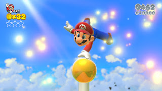 Mario on top of a flag pole in Super Mario 3D World