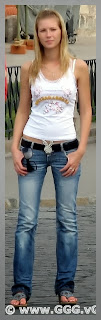 Girl wearing white shirt and low rise jeans