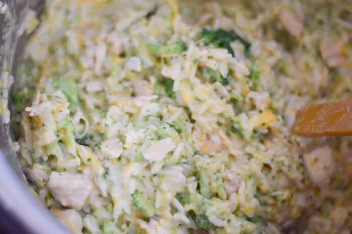 This Instant Pot Cheesy Chicken Broccoli Rice is an easy one pot casserole to feed the whole family. 
