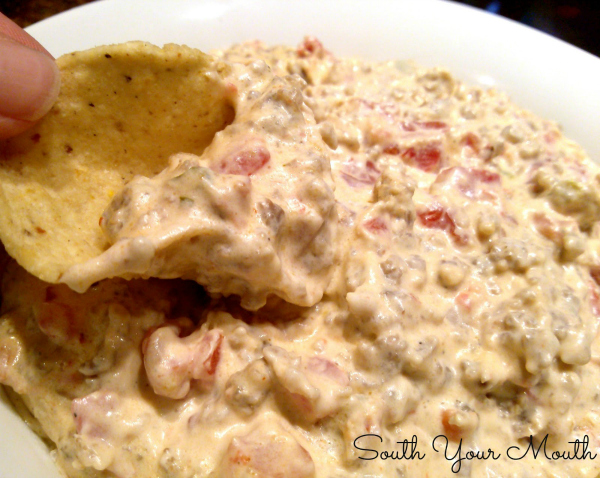 Creamy Sausage Dip {Crock Pot}! Classic party dip recipe made with Rotel tomatoes, sausage and cream cheese served with tortilla chips perfect for tailgating and game day!