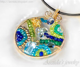 http://www.arctida.com/en/home/109-mosaic-necklace-ooak-apatite-emerald-iolite-lapis-lazuli-peridot-pyrite-and-blue-topaz-necklace-in-14k-gold-filled.html