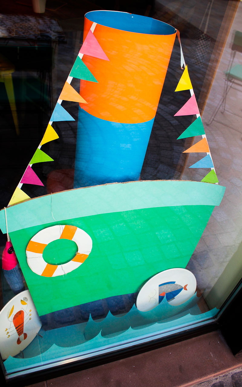 paper cut window display by Camille Epplin