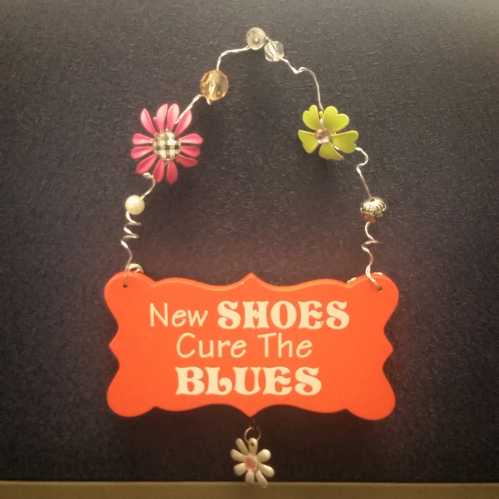 Through the Sole A shoe blog New shoes cure the blues New shoe sign