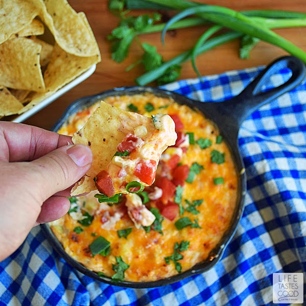 Hot Corn Dip Recipe | by Life Tastes Good is an easy-to-make appetizer that is ready to eat in just 10 minutes! Loaded with sweet crunchy corn, tangy cream cheese, and spicy tomatoes, this Mexican inspired dip won't last long at your next party!
