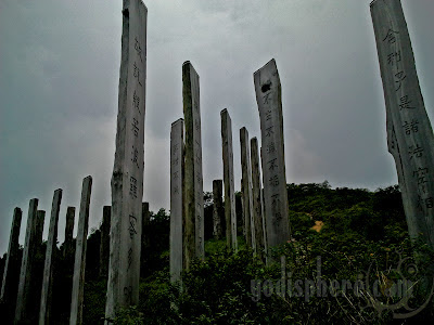 Heart Sutra inscribe on wooden pillars at Wisdom Path Lantau Island