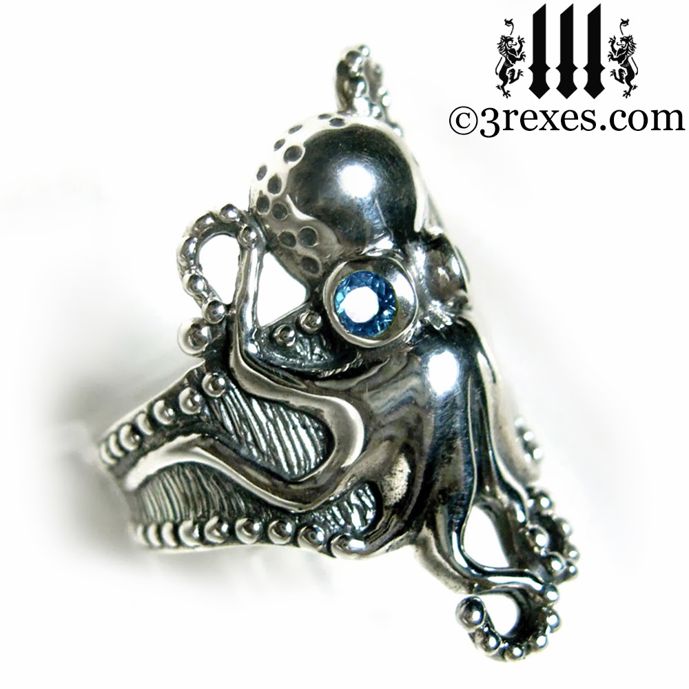 silver octopus ring blue topaz eyes 