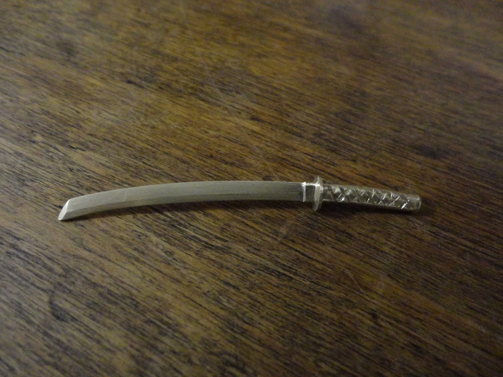 Arte en bronce y madera: Espadas