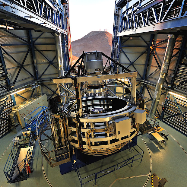 ESO's VISTA telescope with the VLT in the background at sunset