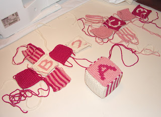 knit blocks in progress pink white