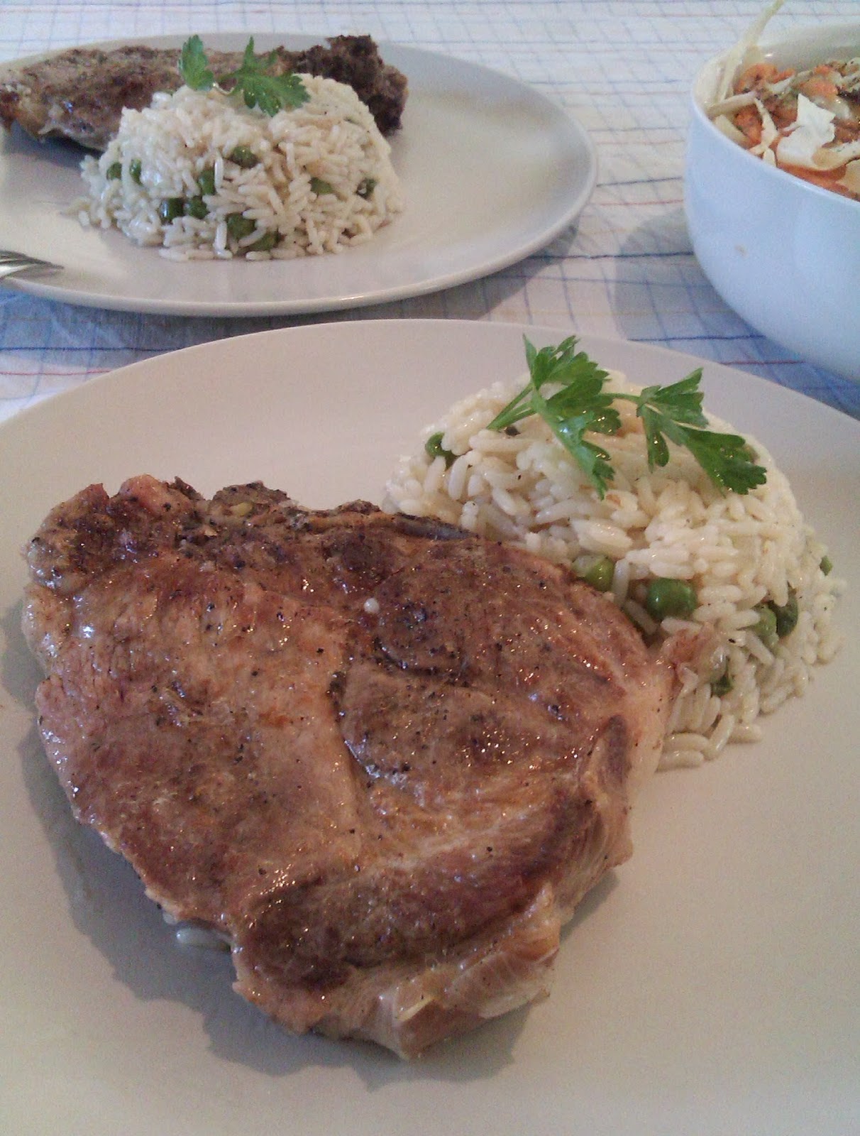 Pork steaks in the oven with rice