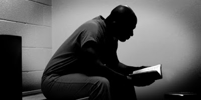 slide-inmate-reading-bible.jpg