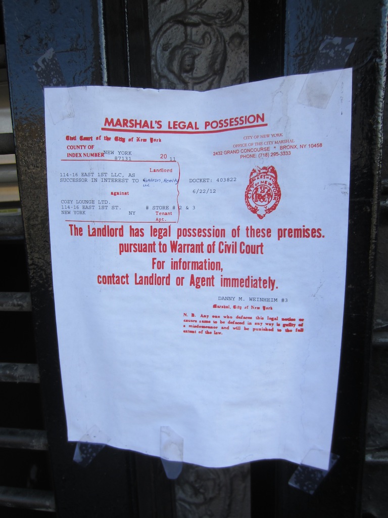 New York City Marshal legal possession notice posted at a property.