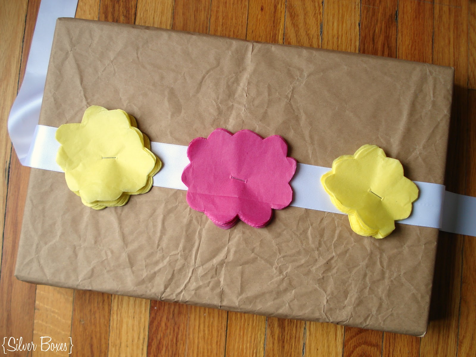 Silver Boxes Tissue Paper Flowers to Embellish a Gift Package