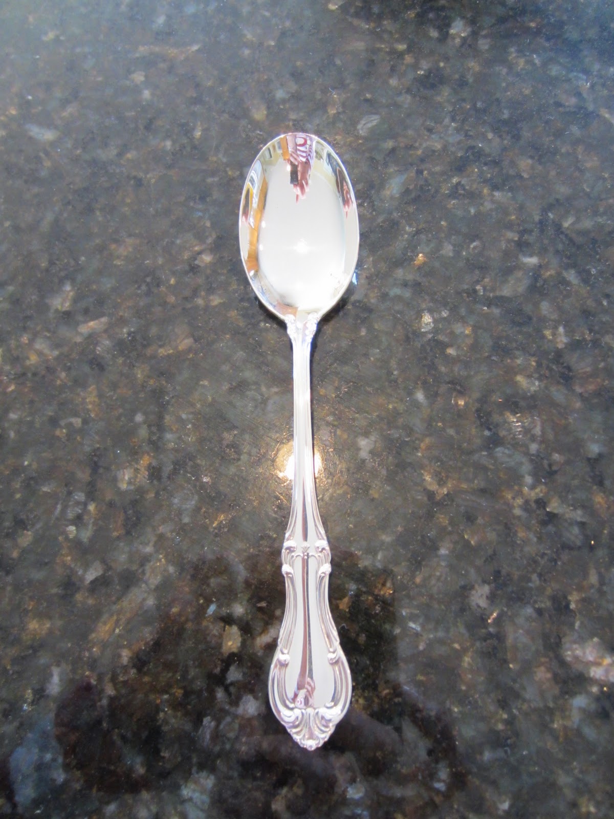 shiny silver spoon