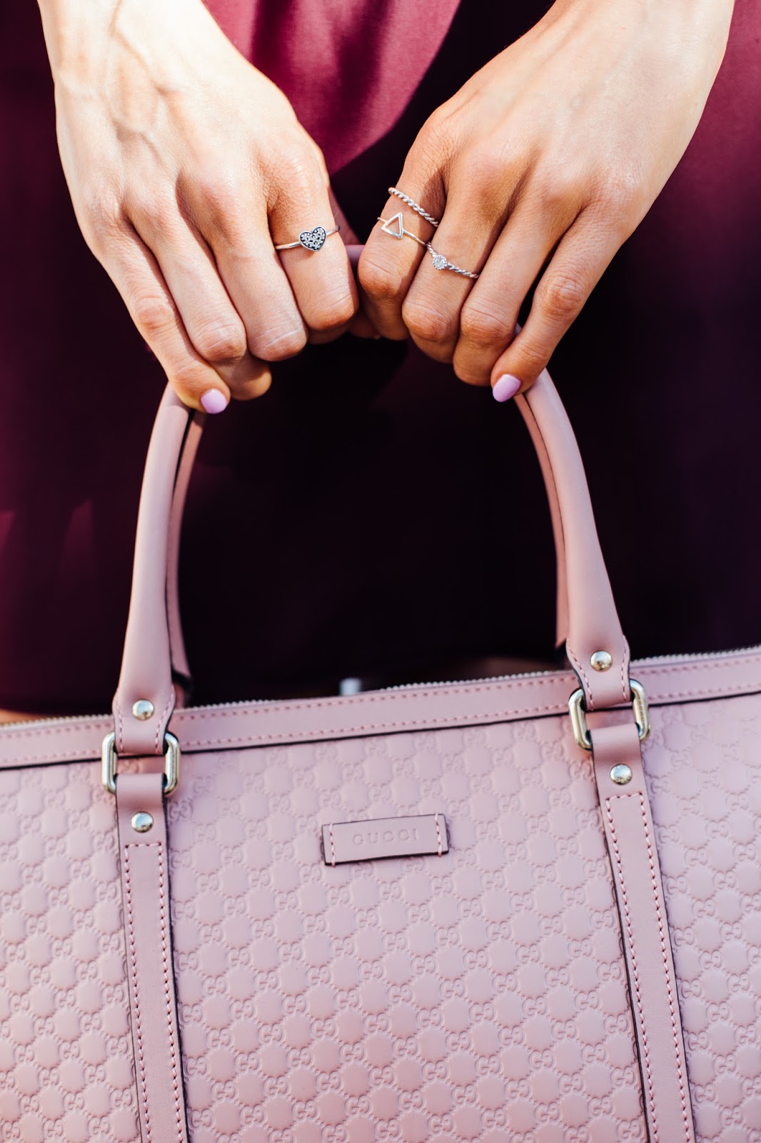 Gucci Signature Top Leather Handbag in pink close up, Guccisimma print 
